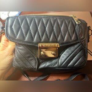 Miu Miu Black Quilted Crossbody Bag with Gold Accents